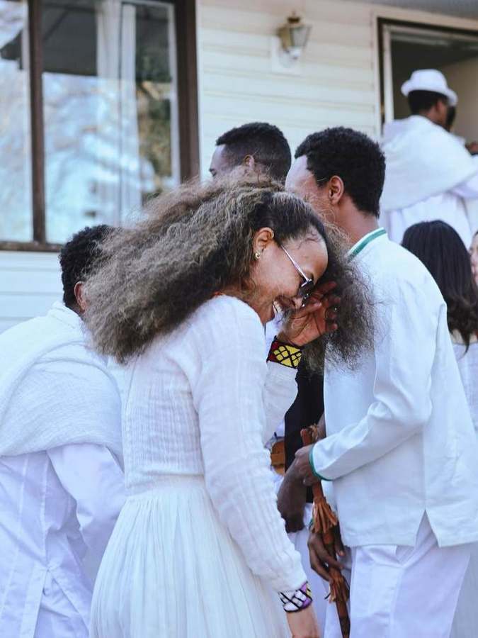 Friends laughing together, close and candid