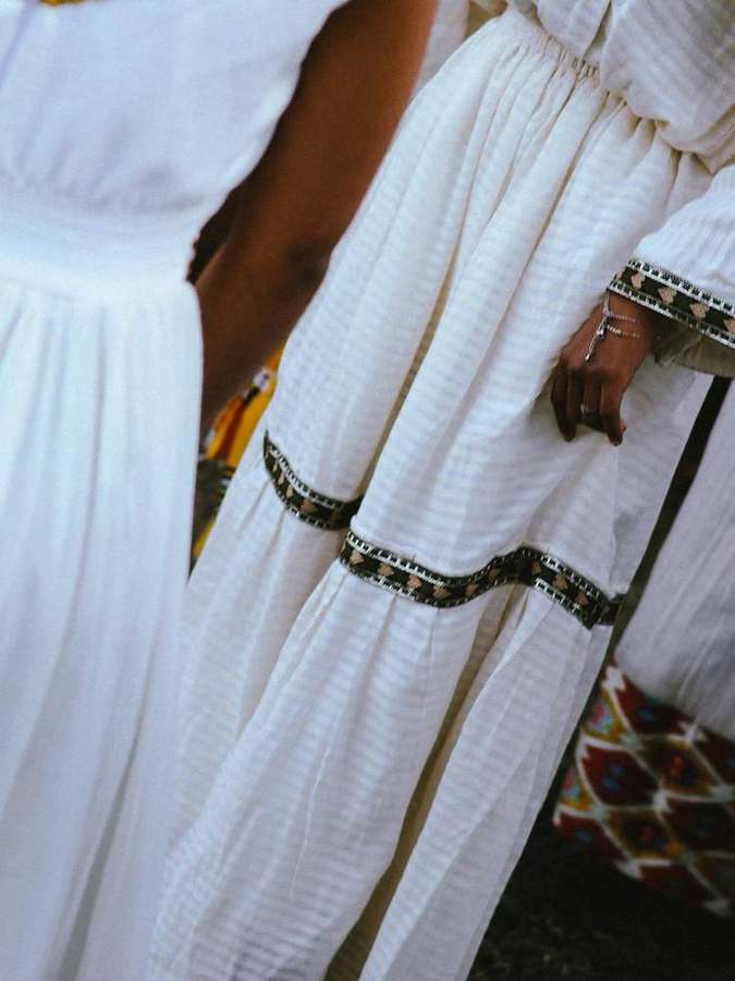 Detail of a skirt with a woven trim band